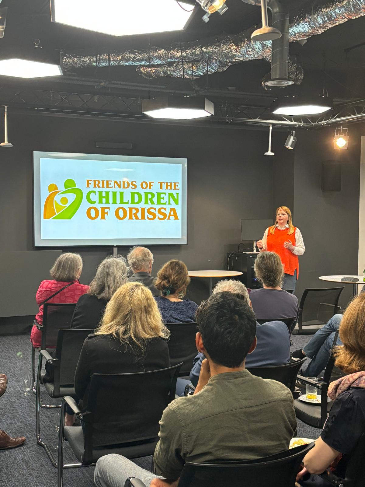 Kate giving a presentation about FOCO